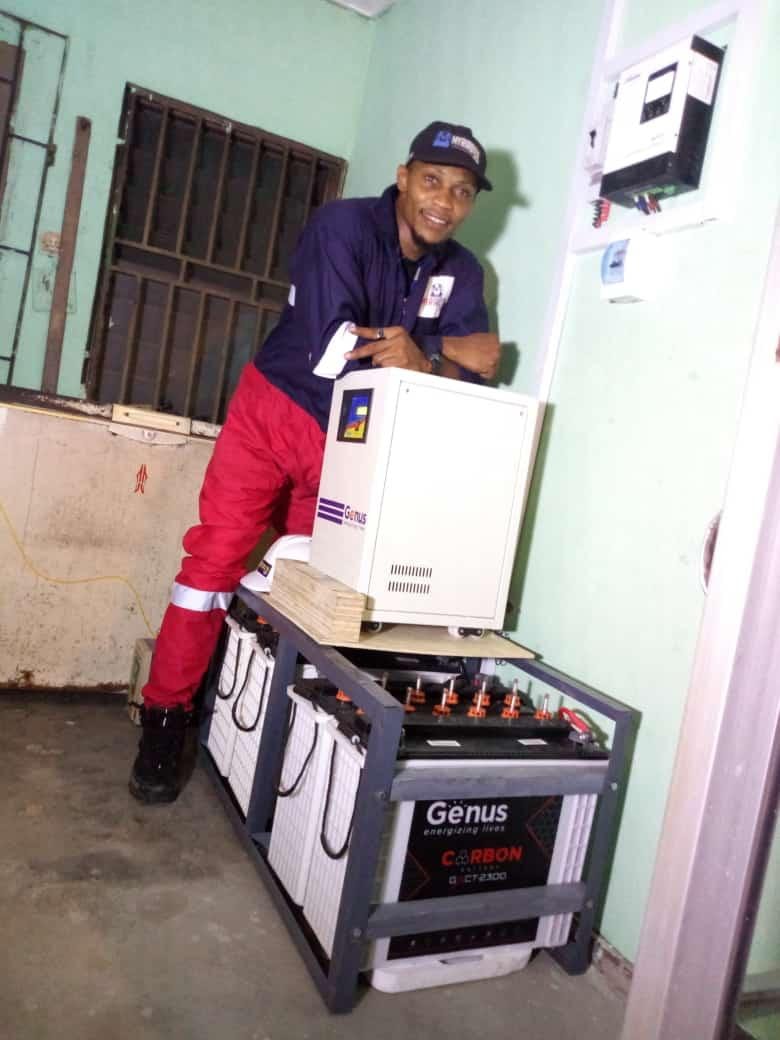 Myriadtex engineer with Genus solar inverter and battery bank